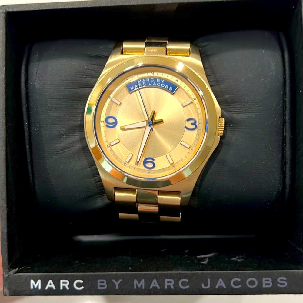 Marc by Marc Jacob’s gold colored stainless steel metal watch
